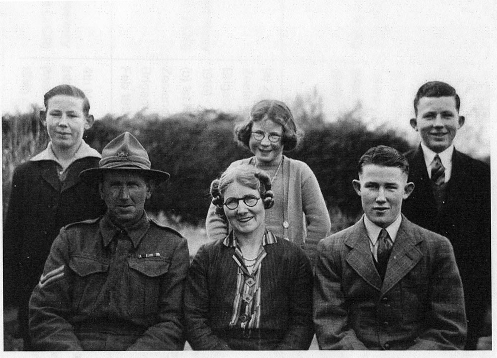 James Smith (in uniform) and family, circa 1942-1943