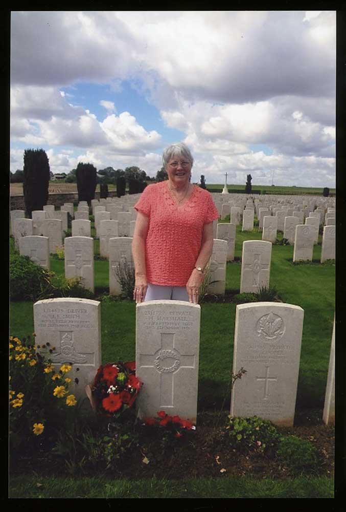 Fay Johnston visiting the grave of her grandfather Private Herbert Marshall, 2014