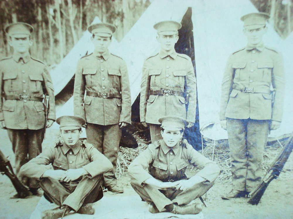 Robert (Bob) Henry Smith (front right) and tent mates