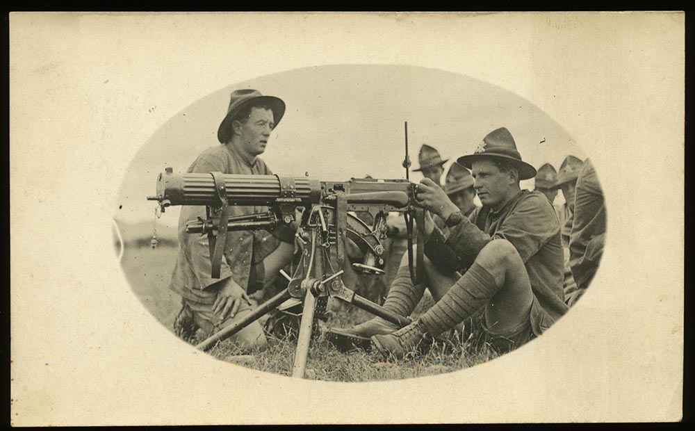  Godfrey (Toby) Burrows, posed behind the machine-gun, while training at Burnham Military Camp, circa 1918