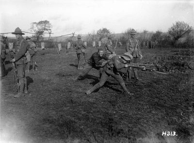 An instructor teaches bayonet technique in France, 31 October 1917