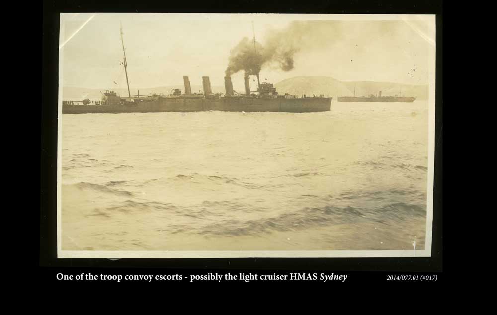 One of the convoy escorts - possibly the light cruiser HMAS Sydney